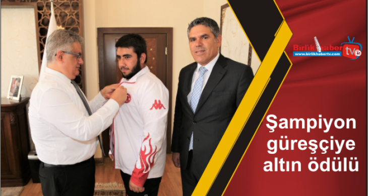 Şampiyon güreşçiye altın ödülü